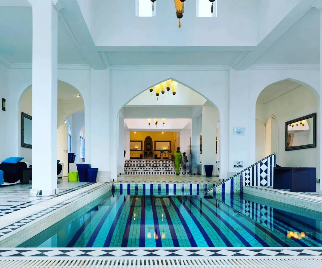 Spa entry with white arched columns